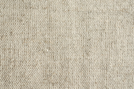 Grey background of coarse linen with a textureの写真素材