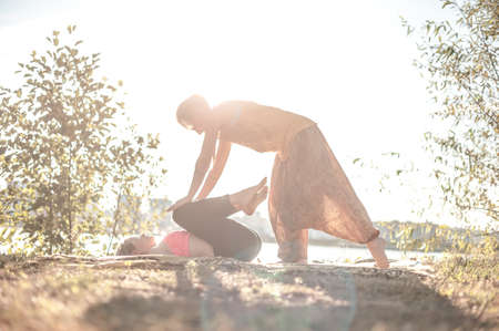 Massage professional impliments her massage abilities in nature.の写真素材