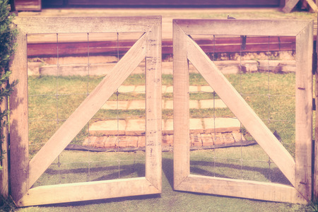 wooden fence and gate open to farm - vintage styleの写真素材