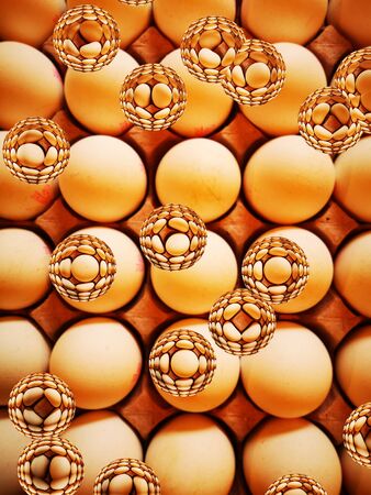 droplets forming image of a full top down view of tray or carton full of many raw eggs with creative imaginativeの写真素材