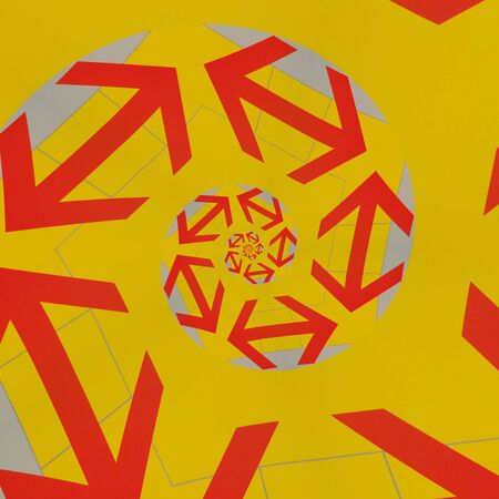 intricate spiral variations through design all based on single red arrow on vibrant yellow backdrop
