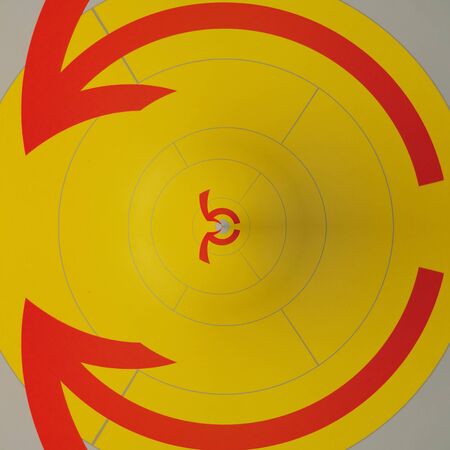 simple bright twin circular red direction arrow on yellow background patterns and design