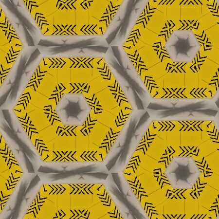 simple bright black on yellow direction arrow hexagonal patterns and designの写真素材