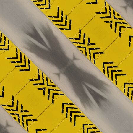 intricate variations through design all based on multiple black diagonal on a vibrant yellow chevron