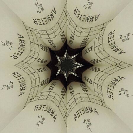 analogue retro electrical ampere meter transformed into unique patterns and intricate designsの写真素材
