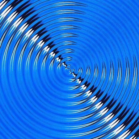 radial radar type pattern from two pronged fork design in black and white against a vivid royal blue a textured wall transformed into intricate patterns by reflection and twistingの写真素材
