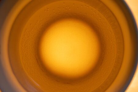 Air bubbles in a cup of tea.の写真素材