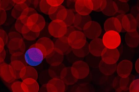 Abstract night light bokeh defocused background. Christmas background.の写真素材