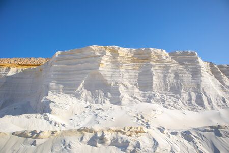 Embossed sand mountains of white sands. Desert landscape.の写真素材