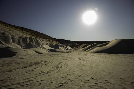 Sunset in desert. A lot of sand. Sand dunes. Desert landscape.の写真素材