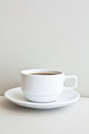 Coffee cup on sofaの写真素材