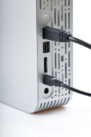 Silver mobile hard disc drive with cable connectionの写真素材