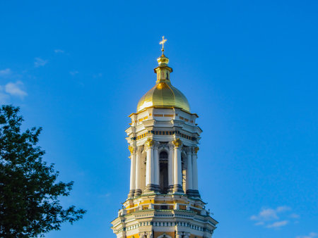 The upper part of the Great Lavra bell tower in Kievの写真素材