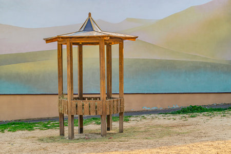Wooden gazebo on the background of a painted wallの写真素材