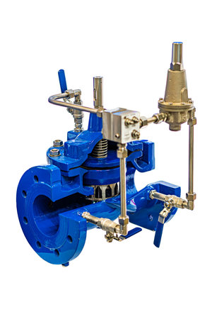 Steel valve assembly with multiple flanges and hydraulic fittings, worn from industrial use....