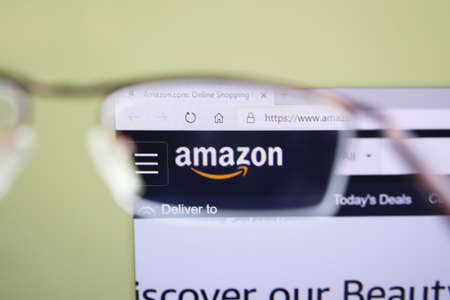 Moscow, Russia - 15 November 2020: Amazon home page browsing through glasses, company logo. High quality photoのeditorial素材