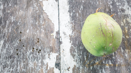 Green and ripe coconut on the table, copy space for text. natural concept.の写真素材