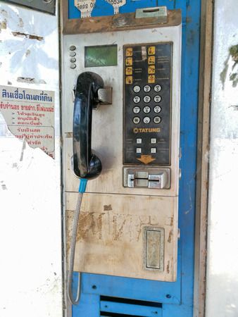 BANGKOK,THAILAND - 2 March 2017 : Public telephones dirty in Bangkok, Thailand.のeditorial素材