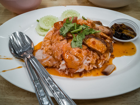 Barbecued red pork in sauce with rice.の写真素材