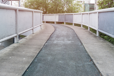 the walk way up stairs overpass in the city., thailandの写真素材