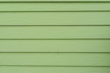 Green mint color wood barn. Woodboard background.の写真素材