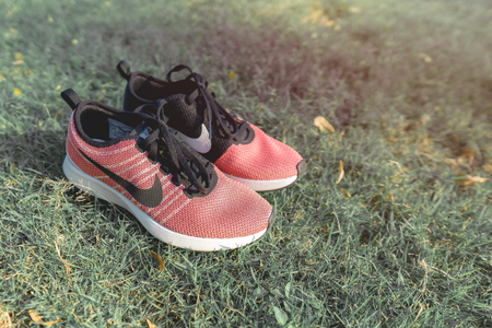 Bangkok, Thailand - March 8, 2018: The NIKE pink shoes of women for exercise at the park.のeditorial素材