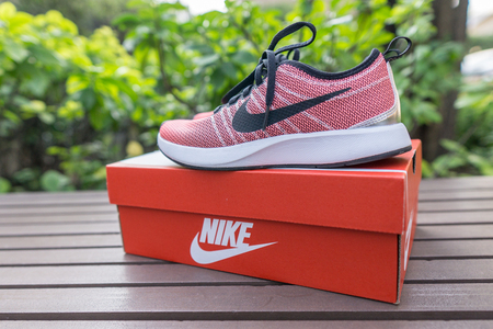 Bangkok, Thailand - March 8, 2018: The NIKE pink shoes of women for exercise at the park.のeditorial素材