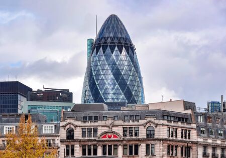 London, UK - April 2018: Swiss Re skyscraper (Gherkin Tower) in London Cityの写真素材