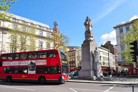 London, UK - April 2017: Double-decker bus on London streets in city of Westminsterの写真素材