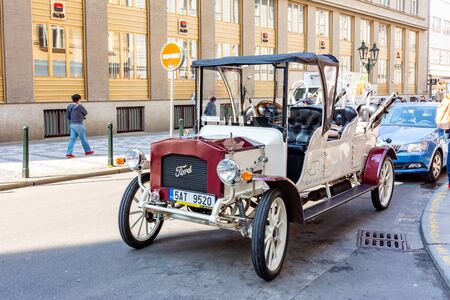 Prague, Czech Republic - May 2019: White retro car in old town