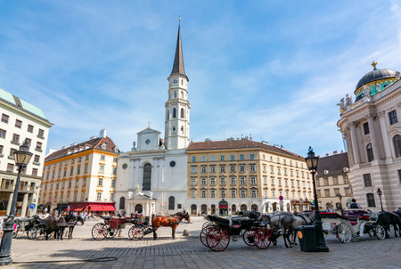 Horse carriages on St. Michael square (Michaelerplatz), Vienna, Austriaのeditorial素材