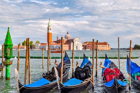 Venice gondolas and San Giorgio Maggiore island, Italyの写真素材