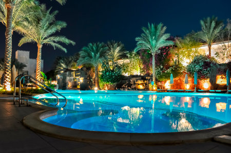 Swimming pool at night in one of the hotels near beach, Sharm El Sheikh, Egyptのeditorial素材