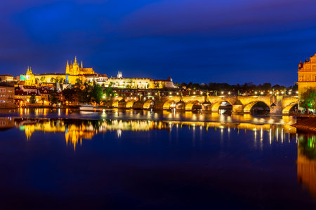 Prague Castle with St. Vitus Cathedral over Lesser town (Mala Strana) and Charles bridge at night, Czech Republicのeditorial素材