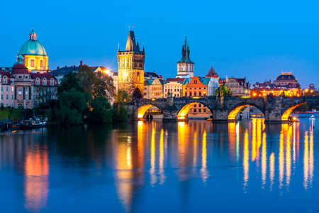 Prague architecture and Charles bridge over Vltava river at night, Czech Republicの写真素材