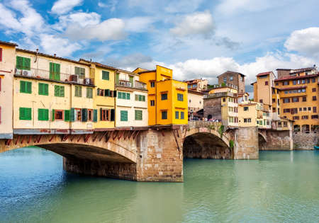 Ponte Vecchio bridge over Arno river in Florence, Italyの写真素材