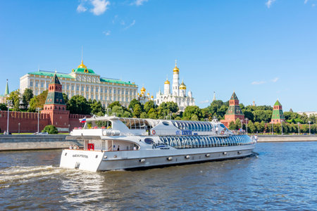 Moscow, Russia - August 2020: Boat sailing on Moskva river with Moscow Kremlin at backgroundのeditorial素材