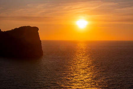 Sunset at sea on Formentor cape, Mallorca island, Spainの写真素材