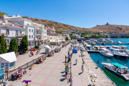Balaklava, Crimea - August 2020: People along Balaklava promenadeのeditorial素材