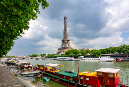 Eiffel Tower and boats along Seine river, Paris, Franceの写真素材