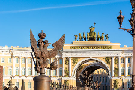 Statues of eagles at Alexander column and General staff building on Palace square, Saint Petersburg, Russiaのeditorial素材