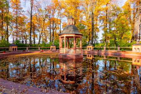 Gazebo and pond in Summer garden in autumn, Saint Petersburg, Russiaの写真素材