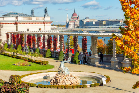 Budapest, Hungary - October 2021: Castle Garden Bazaar (Varkert Bazar) at Royal palace of Buda in autumn with Hungarian parliament at backgroundのeditorial素材