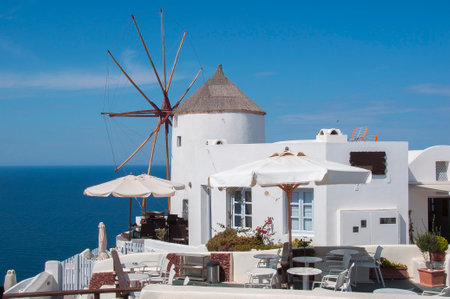 Windmill in Oia village, Santorini island, Greeceの写真素材