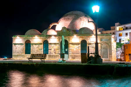 Hassan Pascha Mosque on Chania embankment at night, Crete island, Greeceの写真素材