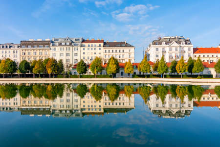 Vienna architecture reflected in pond, Austriaの写真素材