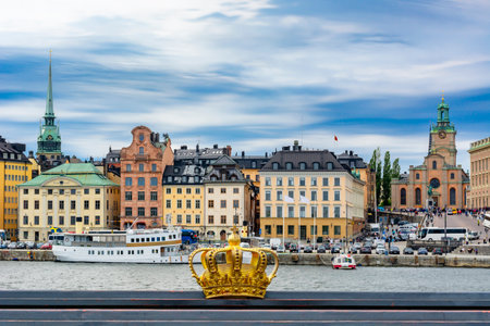 Stockholm old town (Gamla Stan) cityscape and Royal crown, Swedenのeditorial素材