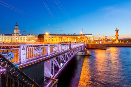 Palace bridge, Kunstkamera museum and Rostral columns on Vasilyevsky island Spit (Strelka) at white night, Saint Petersburg, Russiaのeditorial素材