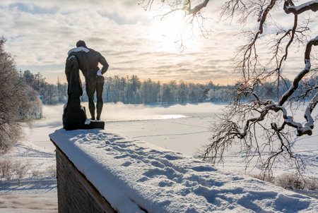 Heracles of Farnese statue on Cameron gallery of Catherine palace in winter at sunrise, Pushkin (Tsarskoe Selo), Saint Petersburg, Russiaのeditorial素材