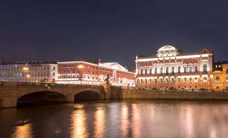Anichkov bridge and Fontanka embankment at night, Saint etersburg, Russiaの写真素材